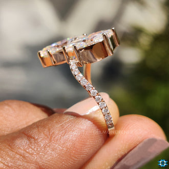 Round cut pave ring with shimmering side stones.
