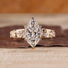 Dutch marquise engagement ring featuring a nature inspired marquise side diamond design.
