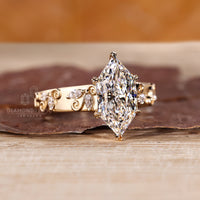 Handmade jewelry inspired by nature with marquise side diamond details.

