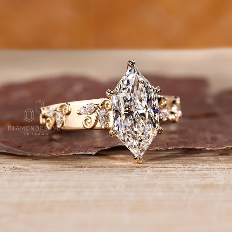 Handmade jewelry inspired by nature with marquise side diamond details.
