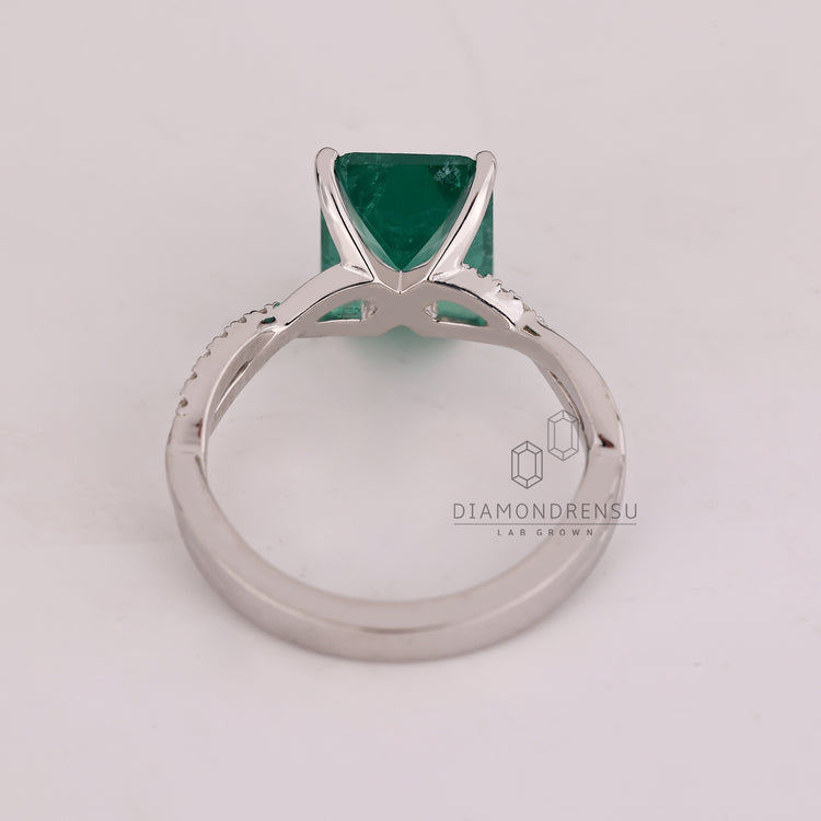 Lab Grown Diamond emerald birthstone ring with white gold setting.
