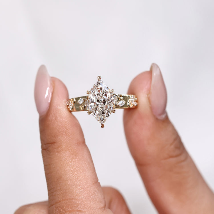 Yellow gold diamond ring with a 6 leaf style prong setting for secure brilliance.
