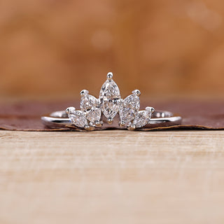 Marquise diamond wedding band with elegant sparkle.
