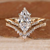 Marquise wedding ring with round cut pave style.