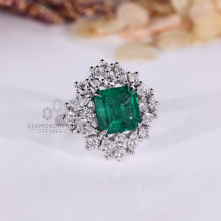 Diamondrensu asscher cut emerald engagement ring.
