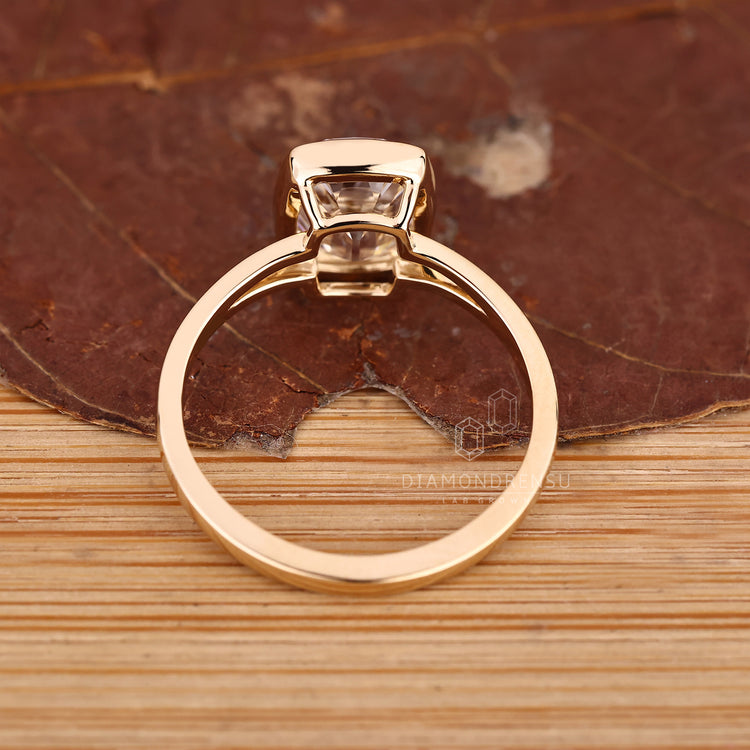 Solitaire diamond ring with lab grown cushion old mine cut.