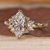 IGI certified nature inspired engagement ring with marquise center diamond.

