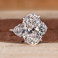 Custom diamond ring with three stone design.
