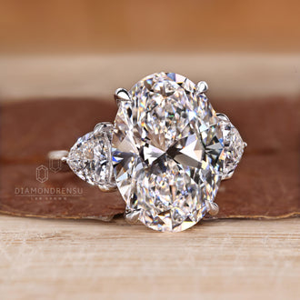 Custom diamond ring with three stone design.
