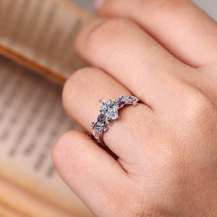 Dutch marquise nature inspired ring with tanzanite marquise side gemstone.
