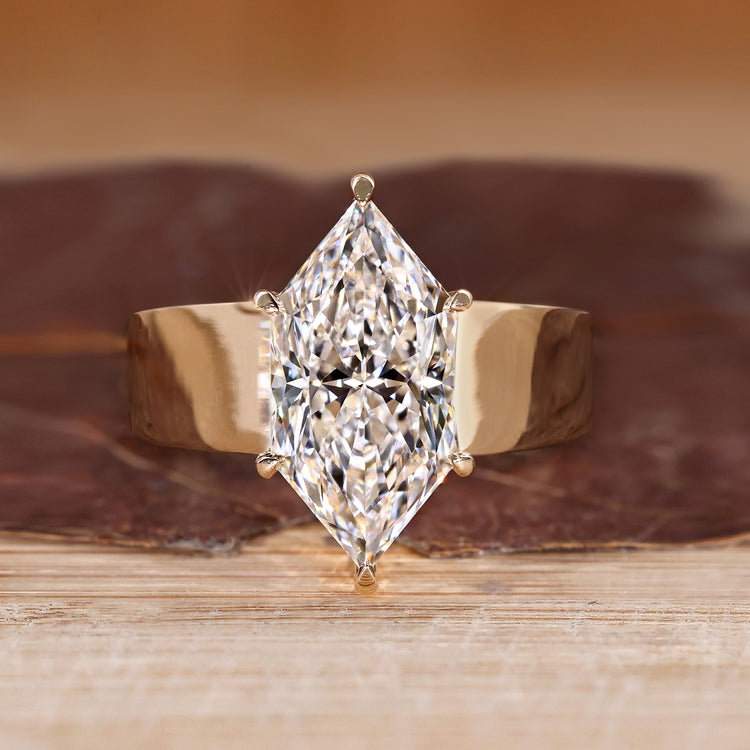 Dutch marquise engagement ring with solitaire diamond.
