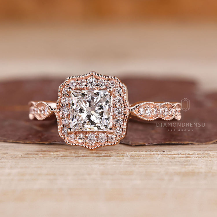 Princess Cut Diamond Ring With Cathedral Setting And Four Prong Design.