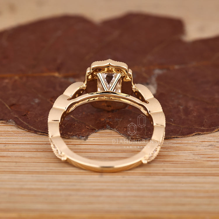 Emerald Cut Diamond Ring With Cathedral Setting And Pave Band.