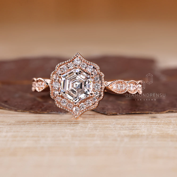 Hexagon Diamond Ring With Cathedral Setting And Four Prong Setting.