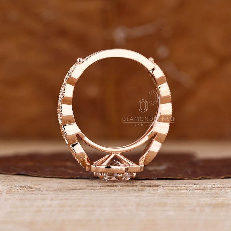 Hexagon Cut Diamond Ring With Pave Band And Milgrain Details.