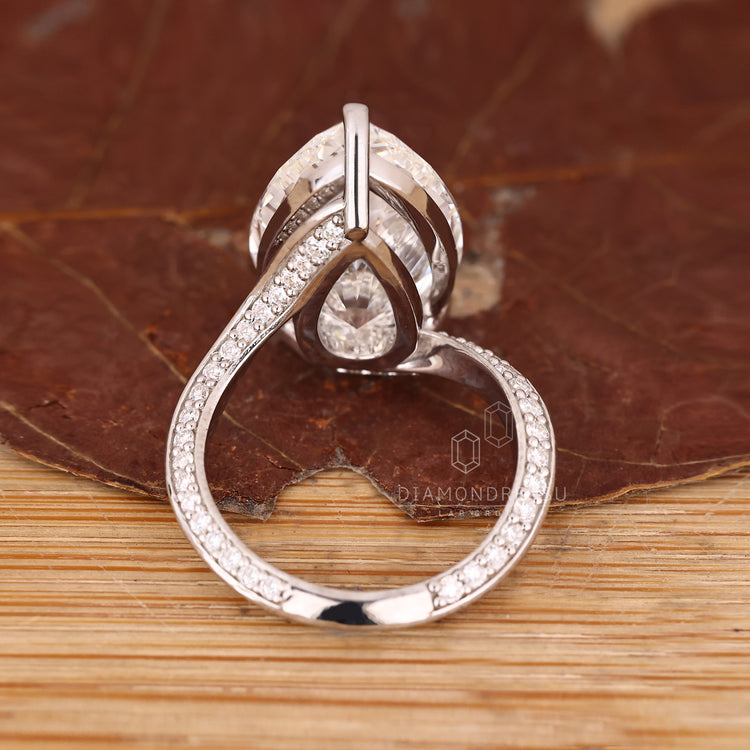 Handmade ring with pave round diamonds.
