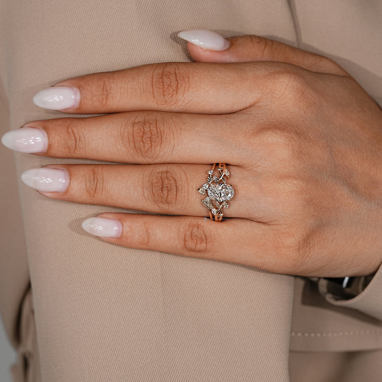 Oval bridal set with a split shank and curvy band.
