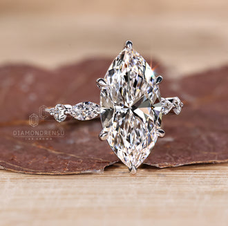 Custom diamond ring with five stone setting.
