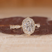 Elongated Cushion Cut Diamond Ring With Cathedral Setting.