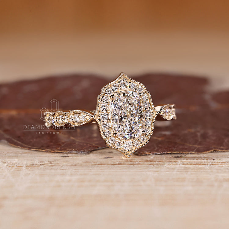 Elongated Cushion Cut Diamond Ring With Cathedral Setting.