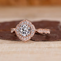 Round Diamond Halo Ring With Four Prong Mount.