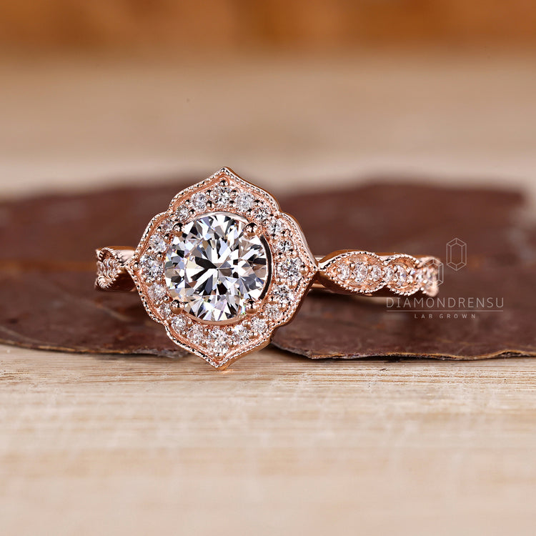 Round Diamond Halo Ring With Four Prong Mount.