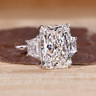 Buy engagement ring featuring a classic 3 stone ring design.
