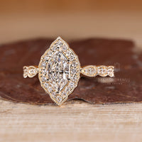 Dutch Marquise Ring With Six Prong Setting And Cathedral Design.