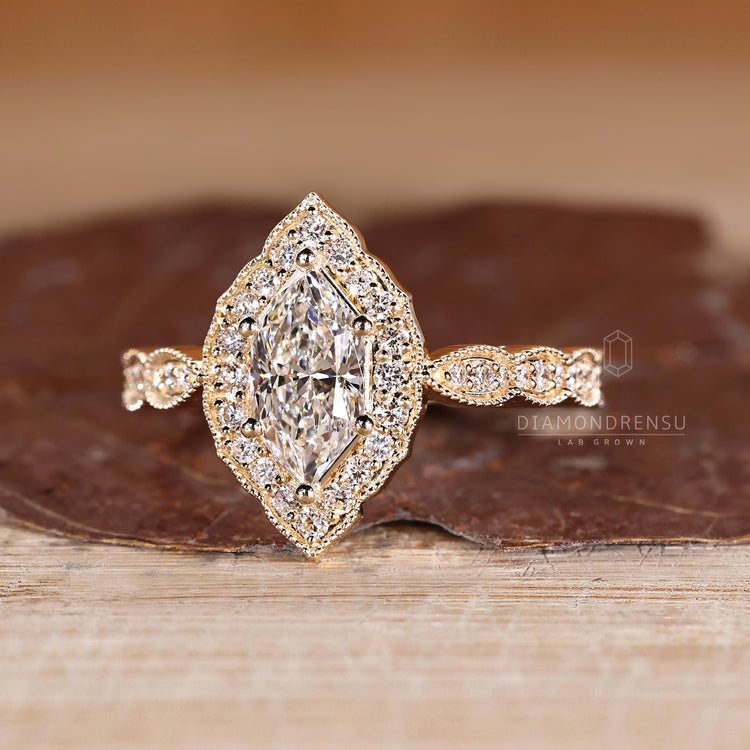 Dutch Marquise Ring With Six Prong Setting And Cathedral Design.