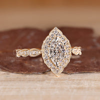 Dutch Marquise Diamond Ring With Milgrain Edge And Pave Band.