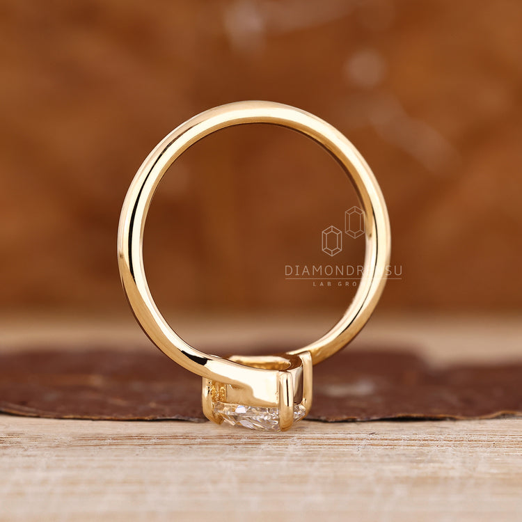 Handmade bypass diamond ring with old European cut marquise.