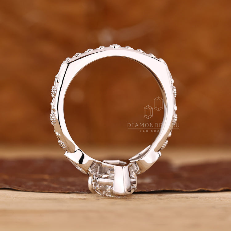 Custom three stone engagement ring in V prong euro shank setting.
