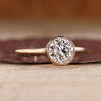 IGI Certified Old European Cut Diamond Ring With Bezel Setting.