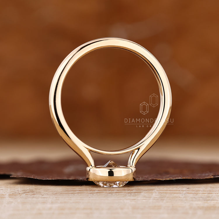 Old European Cut Diamond Ring With Minimal Bezel Detail.