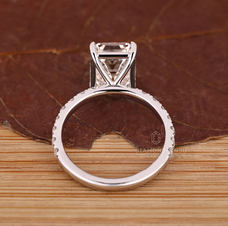 Handmade jewelry emerald cut diamond ring.
