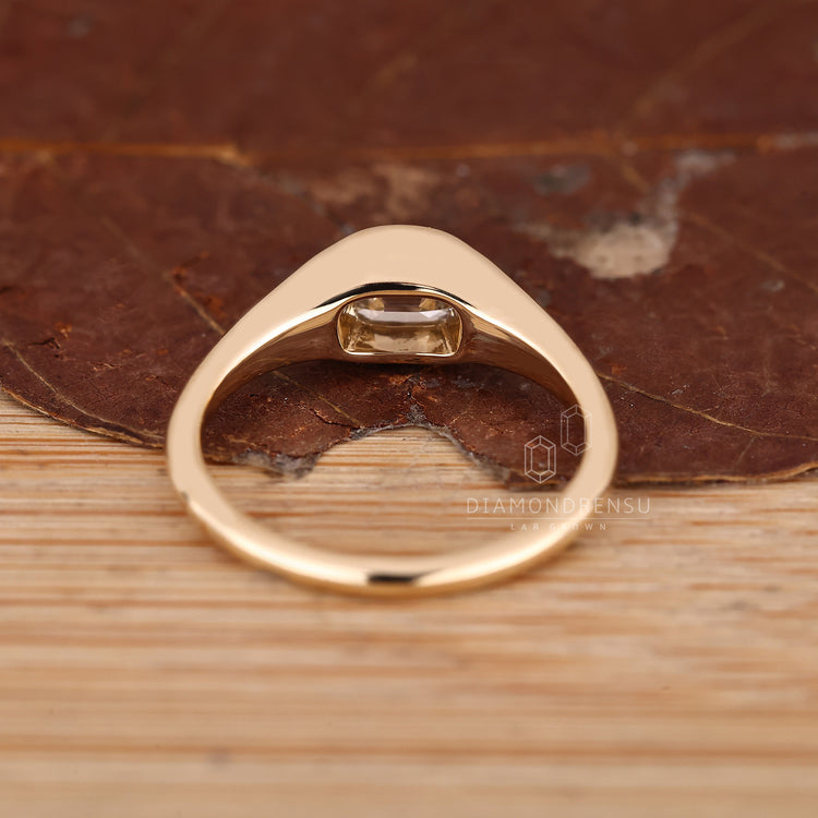 Handmade old mine cushion diamond ring with tapered shank design.