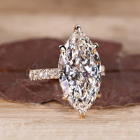 Custom diamond ring with hidden halo setting.
