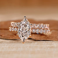 Dutch marquise wedding ring with six claw prongs
