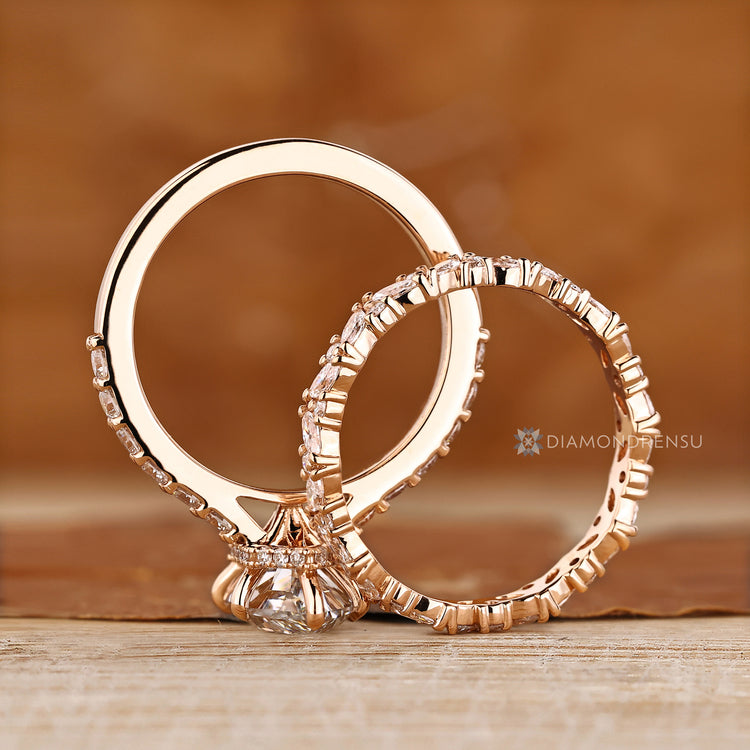 Dutch marquise ring with hidden halo round diamonds