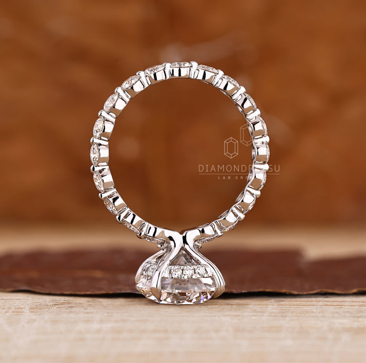 Handmade ring with hidden halo diamonds.
