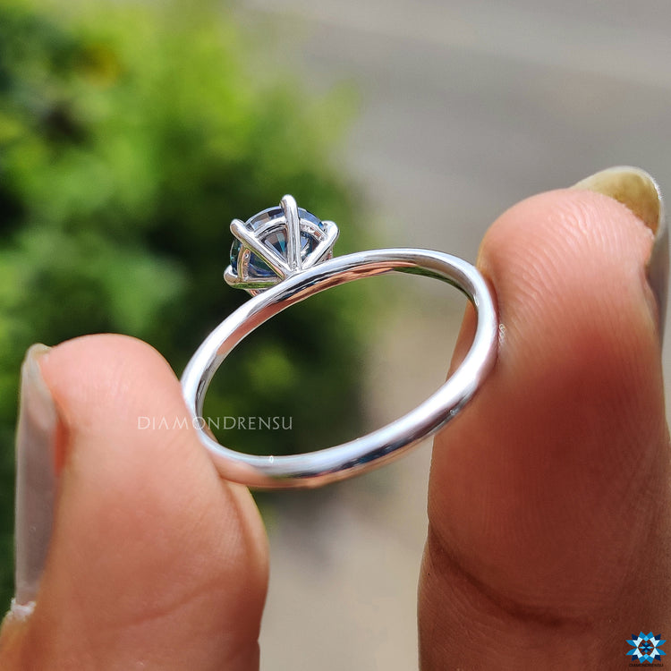 Buy engagement ring with a minimalist solitaire design.
