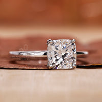 A white gold ring with an intricate design, exuding sophistication and charm.
