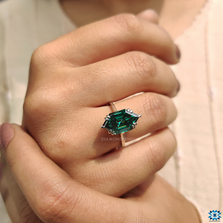 White gold engagement ring with a round hidden halo setting.
