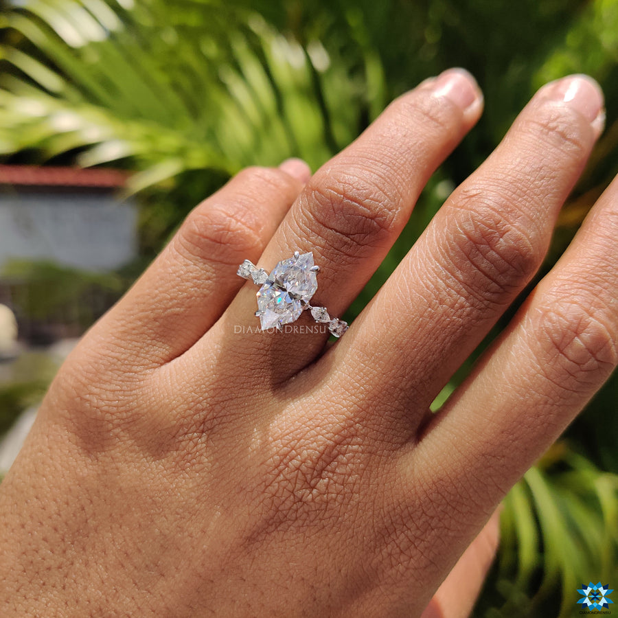 Diamondrensu Dutch marquise moissanite ring side-stone view