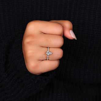 Claw prongs securing a brilliant diamond in a timeless prong setting ring.