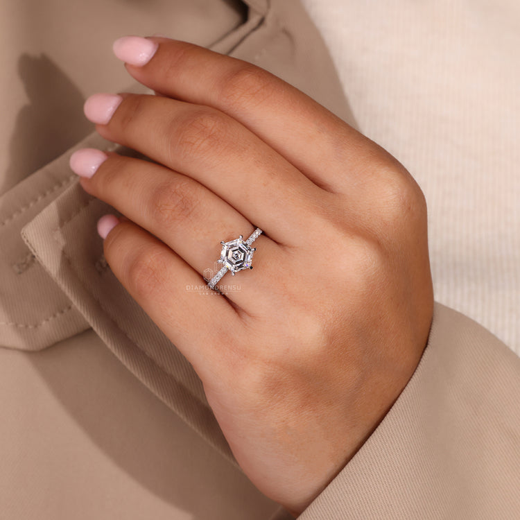 White gold engagement ring with a sleek and modern design.
