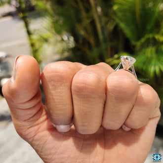Diamondrensu engagement ring with a white gold solitaire setting.
