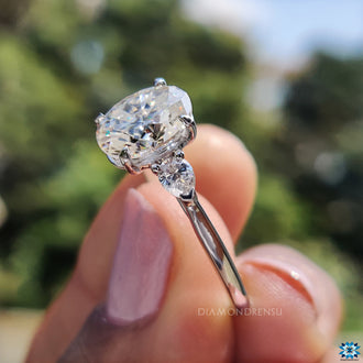 White gold moissanite ring with stunning shine.
