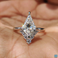 Moissanite engagement ring shines with brilliant clarity.

