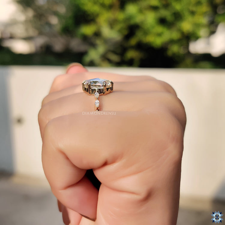 Yellow gold moissanite ring offering a warm and luxurious feel.
